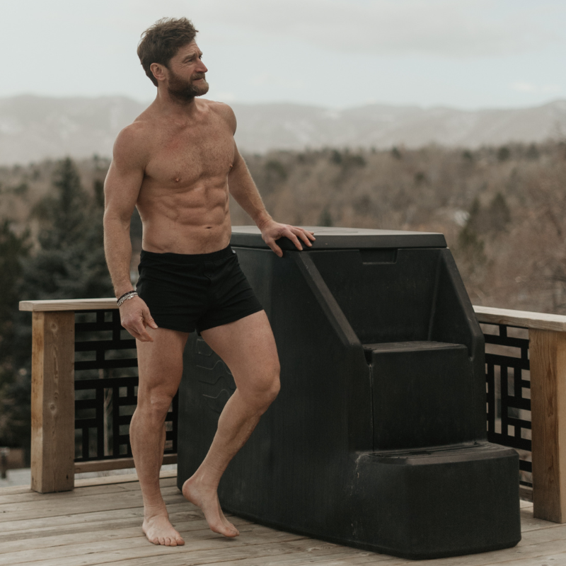 Man standing outside in a NADS Black Organic Cotton Boxer. 
